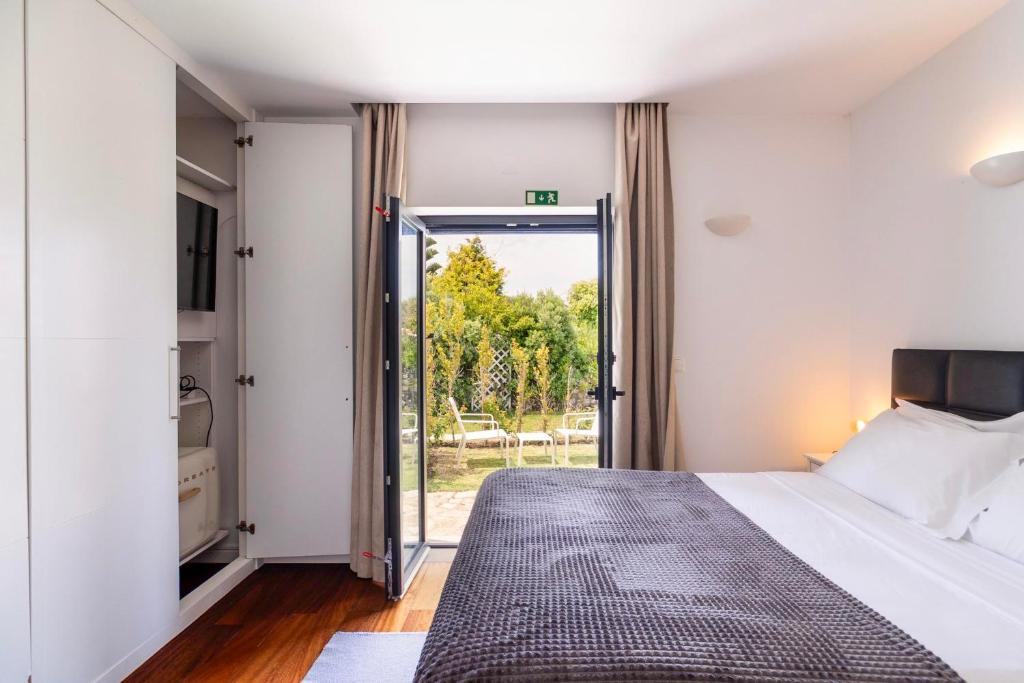 Quarto com acesso directo ao jardim privativo